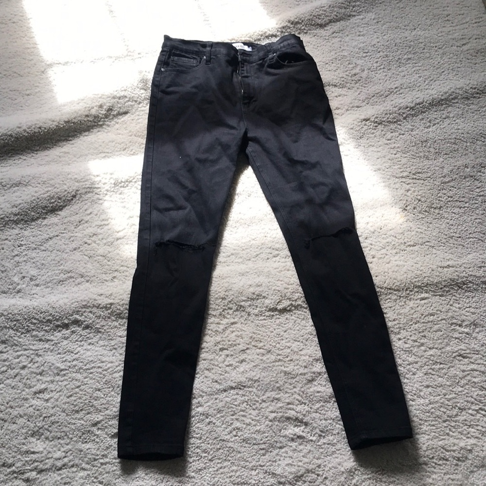 Ripped knee skinny jeans